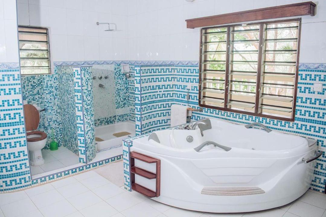 Kijani Cottages Diani Diani Beach Extérieur photo