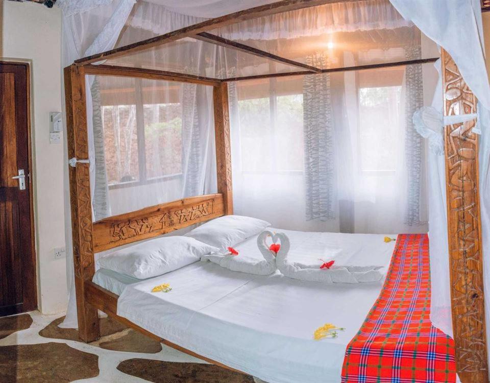 Kijani Cottages Diani Diani Beach Extérieur photo