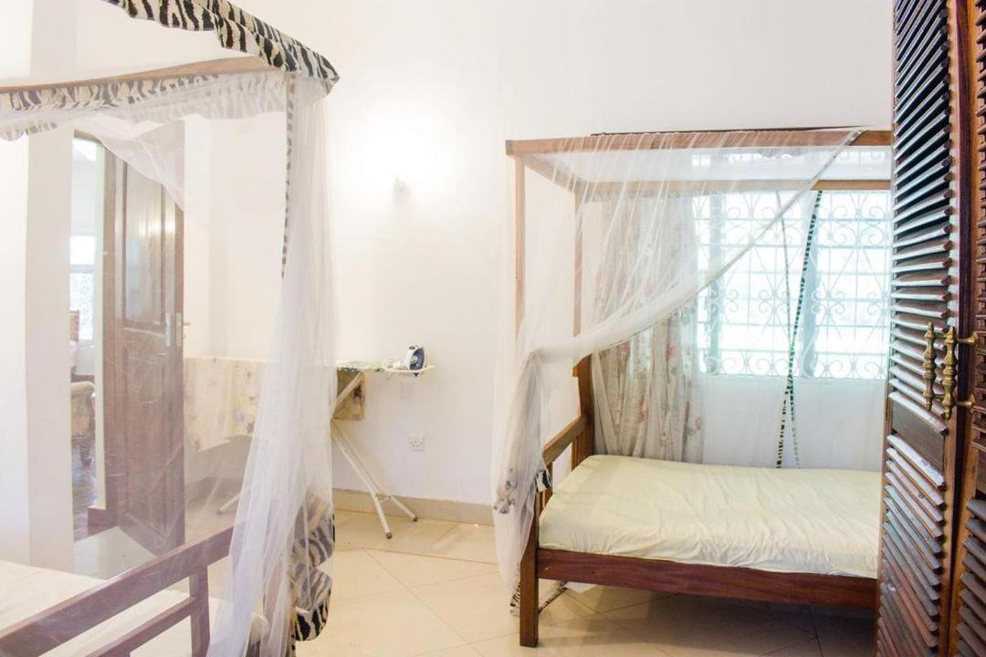 Kijani Cottages Diani Diani Beach Extérieur photo